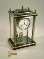 A French four glass mantel clock