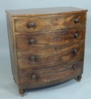 An early Victorian mahogany bow fronted chest of four long drawers