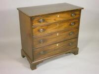 An early 19thC mahogany and pine chest of drawers