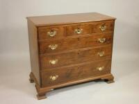 A George III mahogany chest of three short and three long drawers