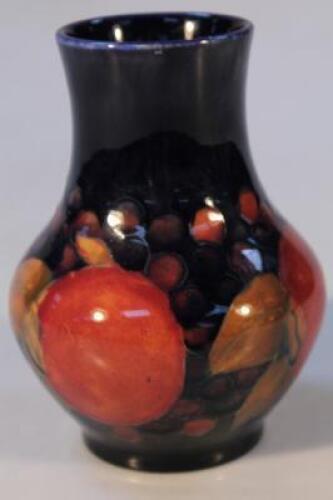 A Moorcroft pomegranate vase