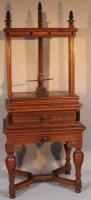 A late 19thC Dutch oak freestanding linen press