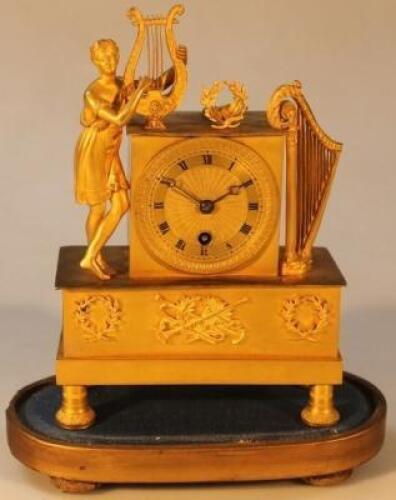 A late 19thC gilt metal mantel clock