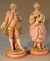 A pair of 19thC style Continental bisque figures of a lady and gentleman