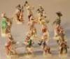 A Meissen eleven piece monkey band figure group