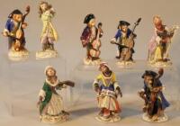 A quantity of Sitzendorf monkey band figures