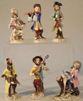 A quantity of continental porcelain monkey band figures