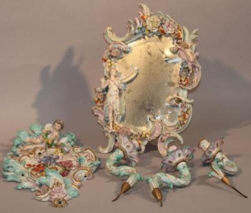 A Continental porcelain table mirror