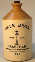 A Dale Brothers two colour Grantham stoneware flagon dated 1931