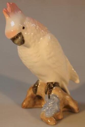 A Royal Dux figure of a parakeet