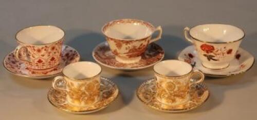 A quantity of Royal Crown Derby cabinet cups and saucers