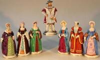 A modern Sitzendorf seven piece Henry VIII and six wives figure group set