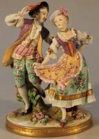 A Sitzendorf figure group of a lady and gentleman dancing