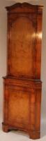 A mid 20thC Queen Anne design walnut veneered freestanding corner cupboard