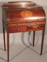 An early 20th century mahogany cylinder bureau