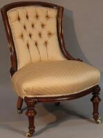 A Victorian mahogany serpentine fronted occasional chair