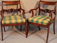 A pair of 20thC Sheraton style carver chairs