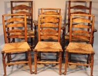 A harlequin set of six early 19thC ash and elm rush seated country chairs