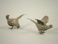 Two silver models of a cock and hen pheasant