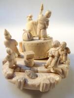 A Meiji period Japanese ivory carving of a fishing scene