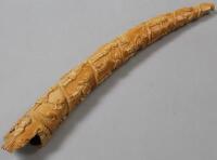 A late 19th/early 20thC carved ivory tusk