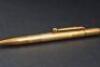 A 9ct gold propelling pencil