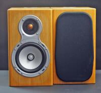 A pair of Monitor Audio GS10 Gold Signature loud speakers.