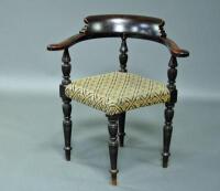 A Victorian ebonised corner chair