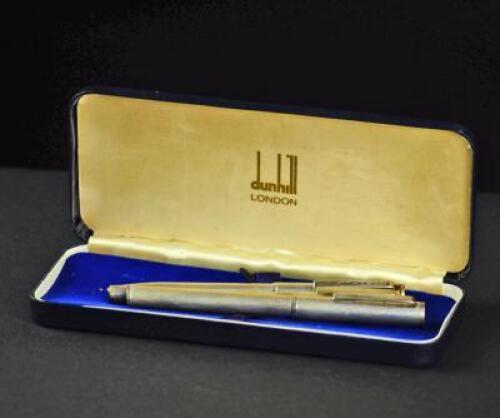 A cased set of Alfred Dunhill three piece pen set