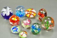 A selection of glass paperweights