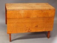 A Victorian oak dropleaf table.