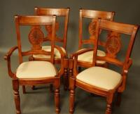 A set of six modern teak dining chairs