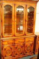 A modern teak glazed display case