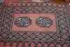 A pair of Middle Eastern prayer mats.