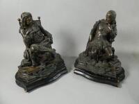 A pair of bronzed spelter figures