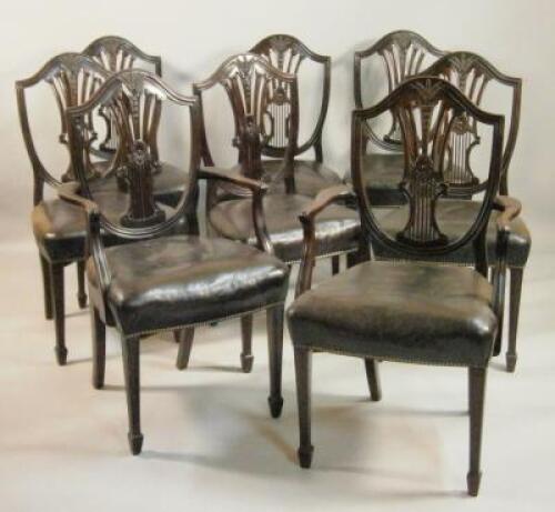 A set of eight late 19thC mahogany dining chairs in George III style