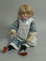 A Gebruder Kuhnlenz bisque headed doll