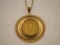 A coin pendant and chain