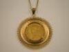 A coin pendant and chain