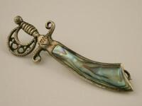 A sword brooch