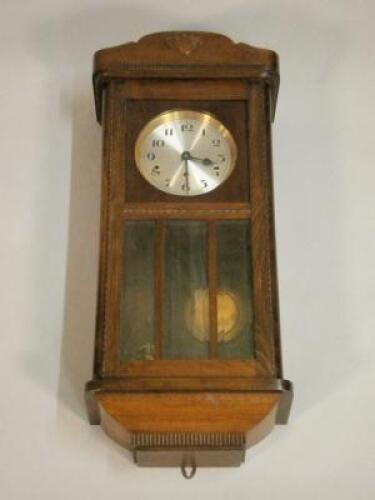 A 20thC mahogany wall clock