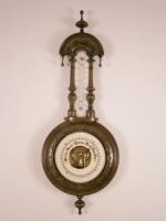 A late Victorian walnut aneroid barometer