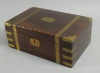 A Victorian rosewood and brass bound writing box