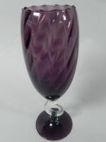 A Venetian style purple glass vase
