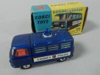 A Corgi Toys police van