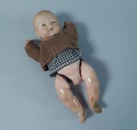 An Armand Marseille bisque headed baby doll