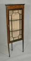 An Edwardian mahogany and marquetry standing corner cabinet