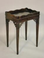 A small mahogany and fiddle back mahogany silver table