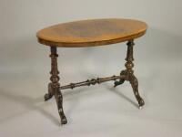 A Victorian walnut and marquetry occasional table