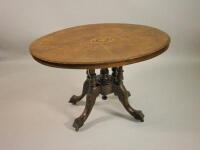 A Victorian walnut and marquetry breakfast table